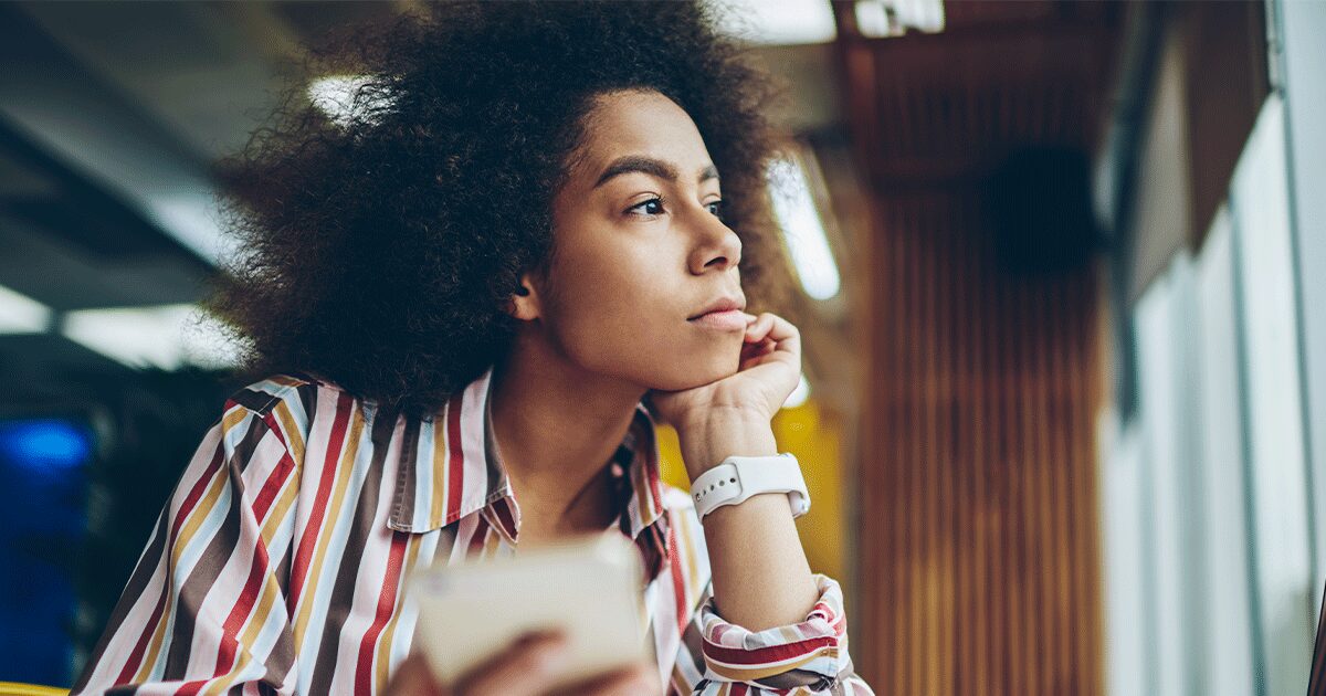 Woman thinking about how to spot human trafficking online